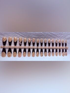 X-Coat Tips 3 In 1 Soft Gel System
Custom Design made nails.